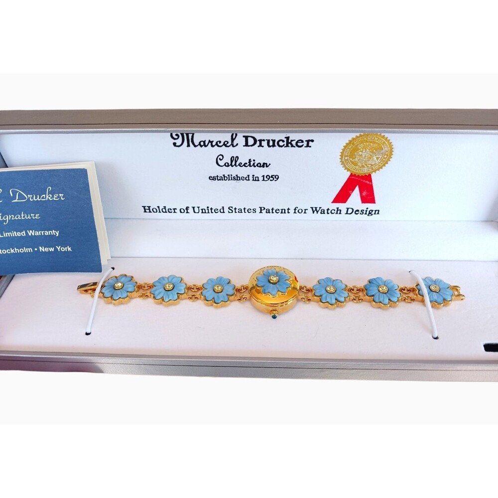 New Women's Marcel Drucker 7" Hidden Face Bracelet Watch Elegant Floral Shape